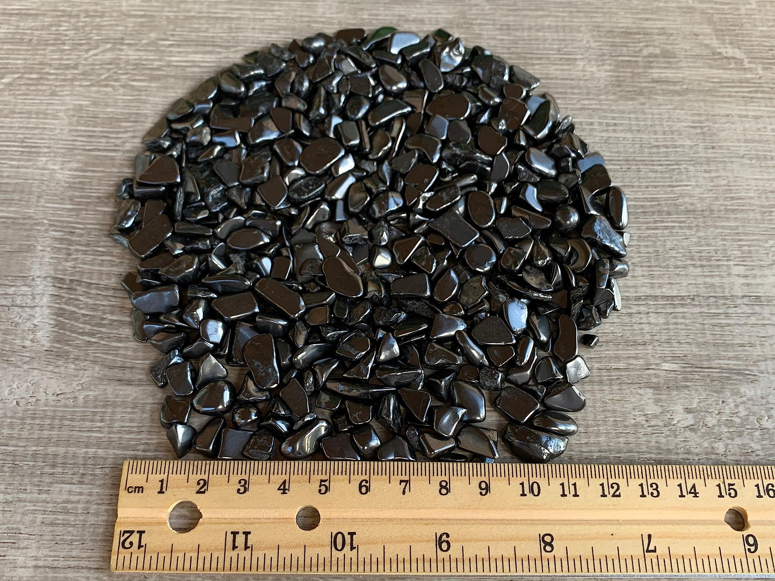 GAF TREASURES Shungite Chips with semi-tumbled finish add natural texture.
