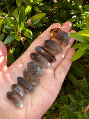 GAF TREASURES Smoky Quartz Point closeup reveals natural facets and color variations.