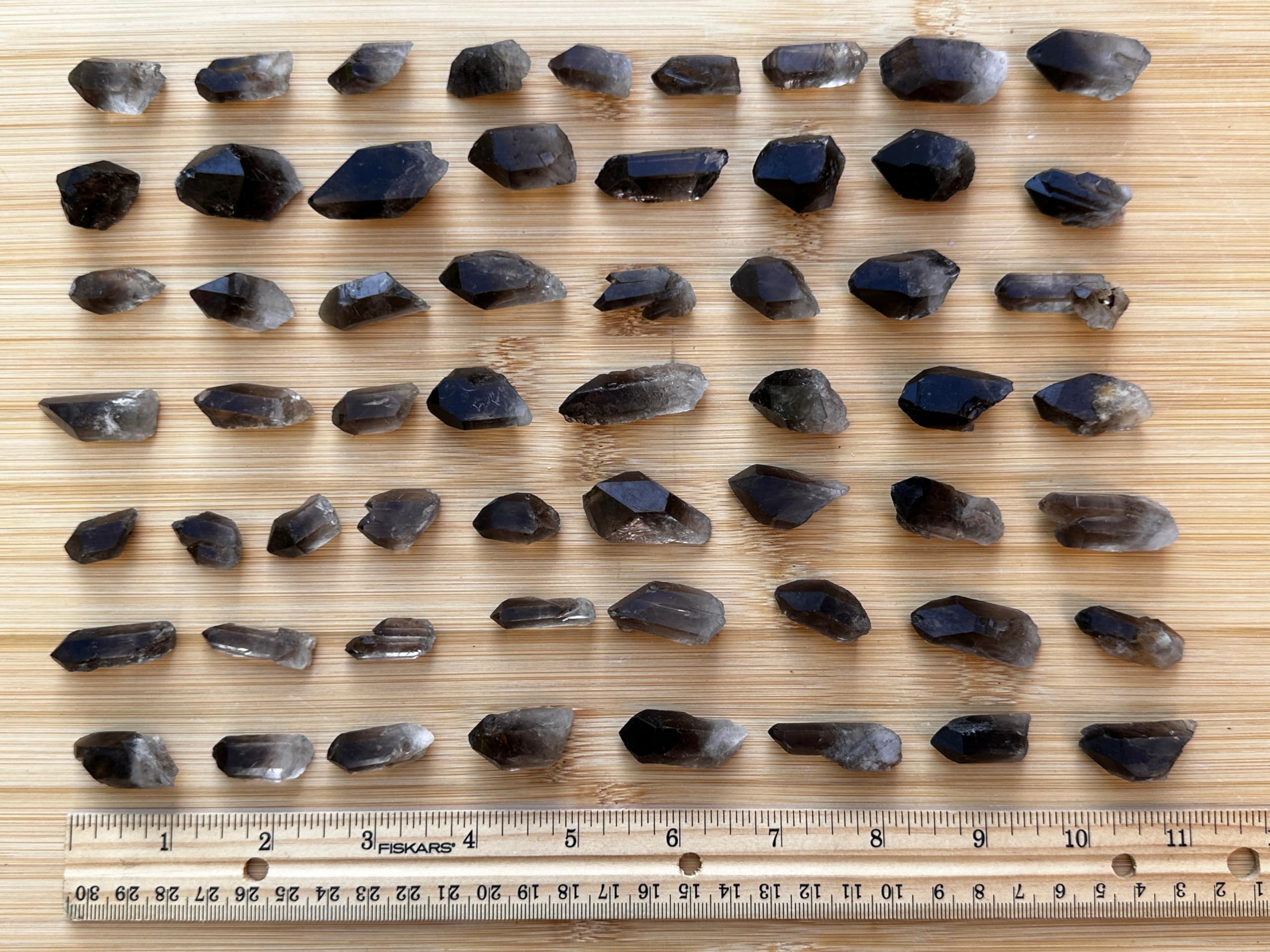 GAF TREASURES Smoky Quartz Point earth-toned crystal supporting grounding spaces.