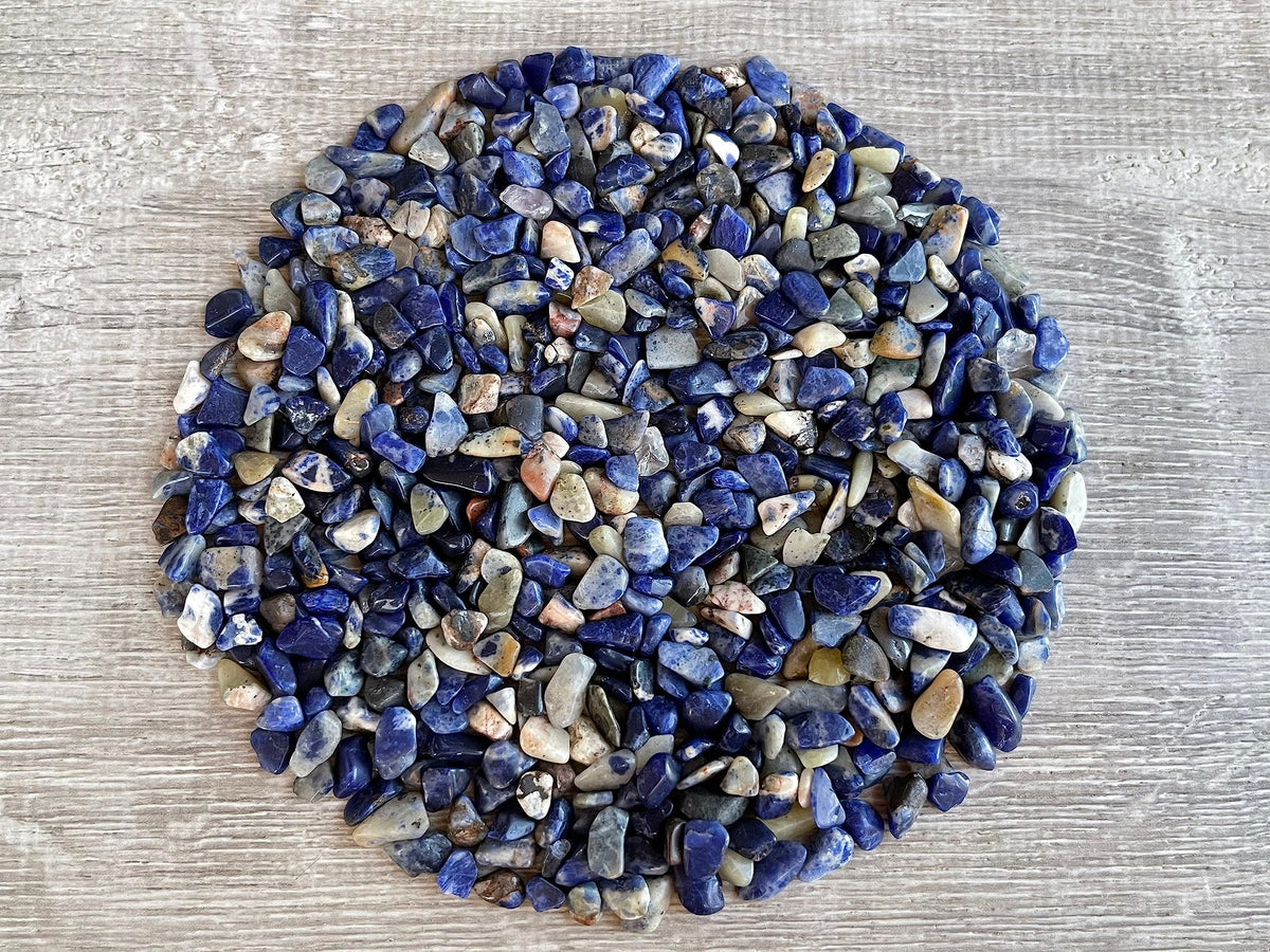 Gaf Treasures sodalite chips close-up showing natural blue hues for crafts.
