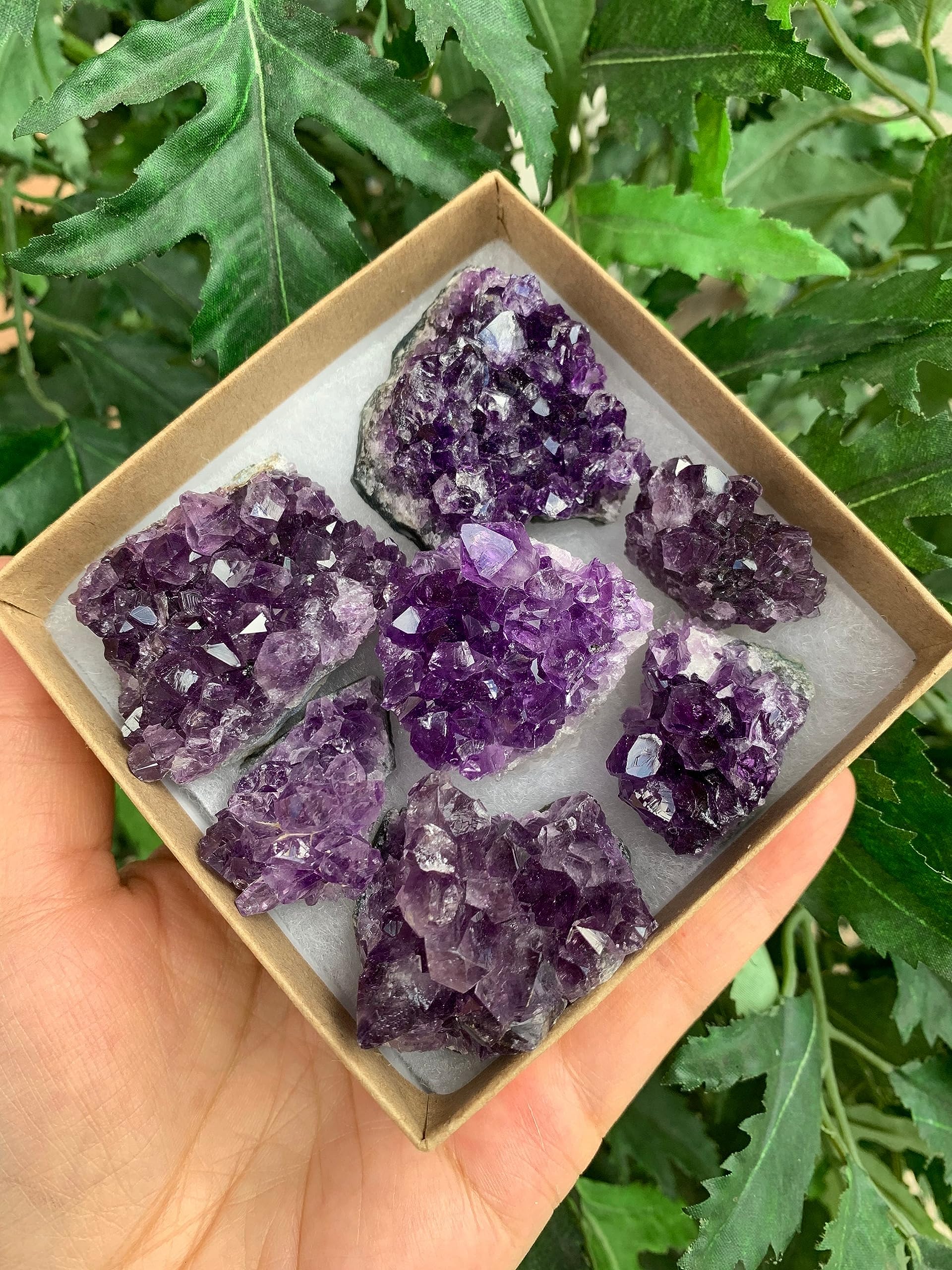 GAF TREASURES Uruguayan amethyst geode collection highlights vibrant purple tones for meditation spaces.