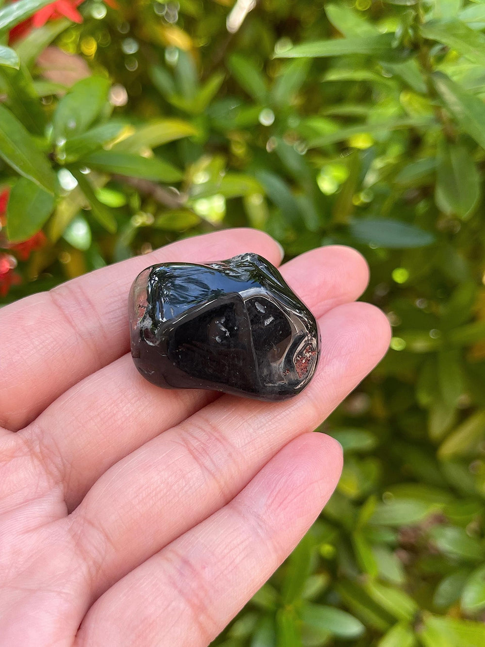 GAF TREASURES pocket-ready black onyx stones for on-the-go grounding.