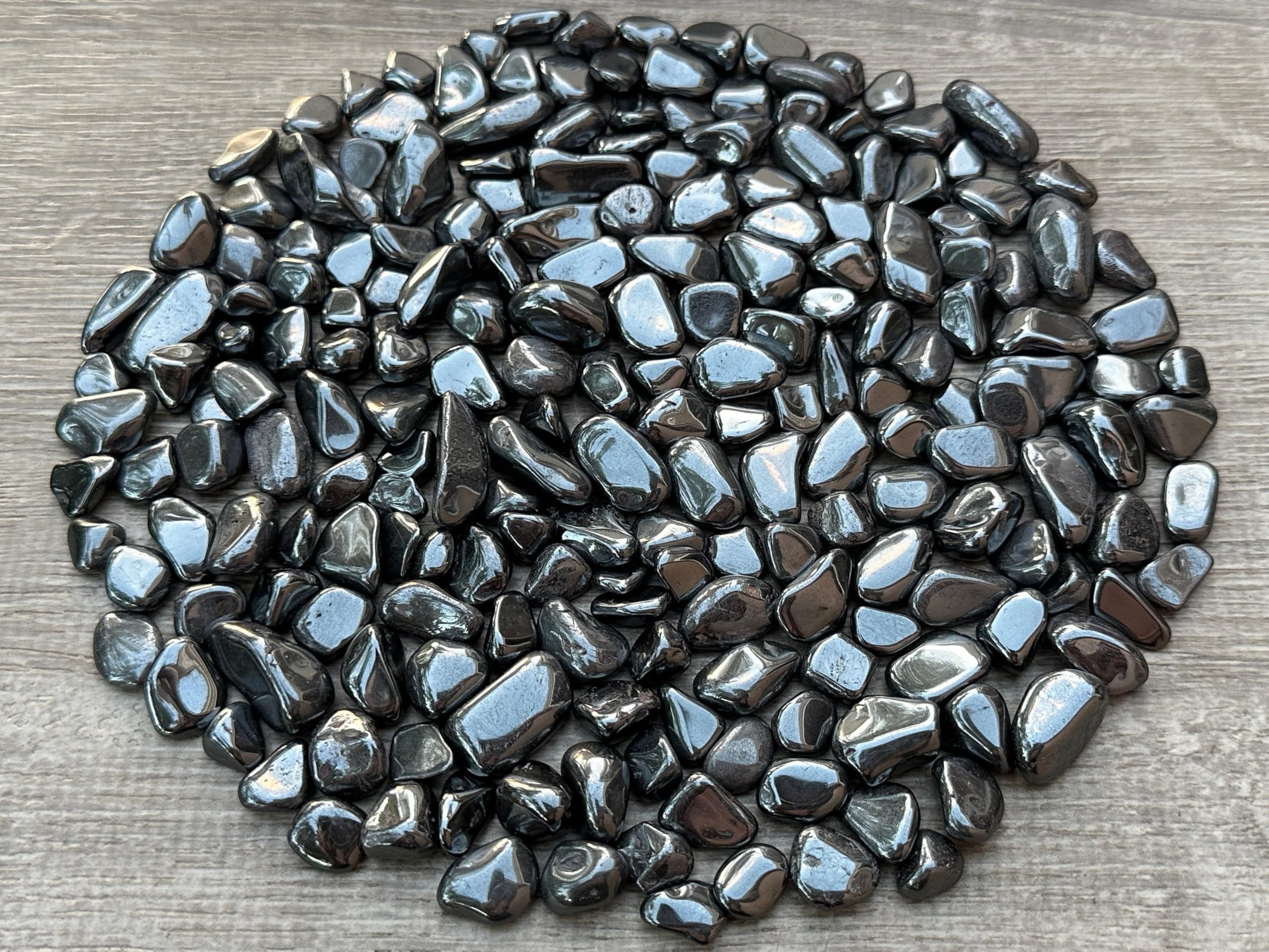 GAF TREASURES hematite large chips closeup shows natural color and smooth edges for crafts.