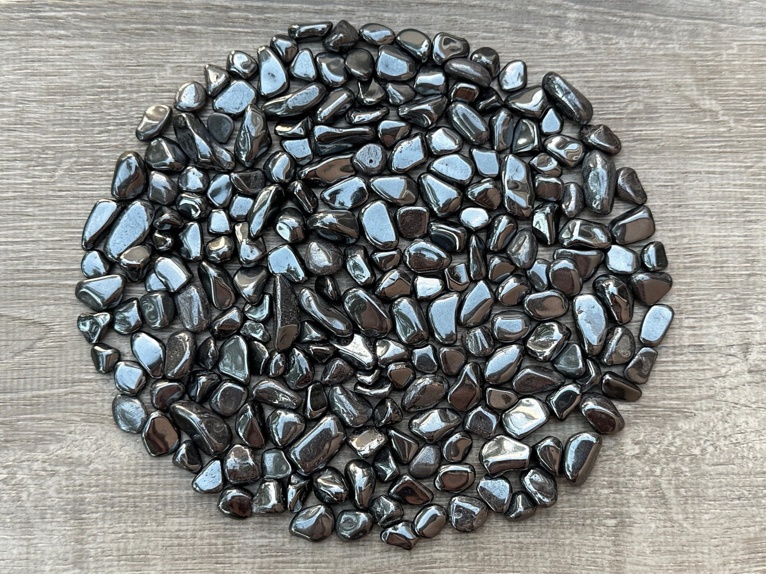 GAF TREASURES hematite large chips closeup highlighting smooth edges for jewelry projects.