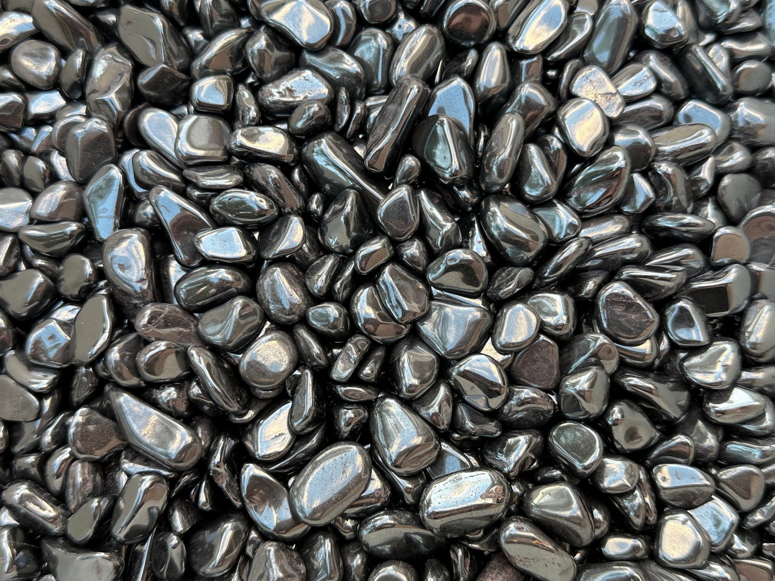GAF TREASURES hematite large chips array suitable for mosaics and terrariums.