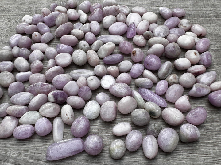 GAF TREASURES Kunzite healing crystals arranged for crystal grid and energy work.