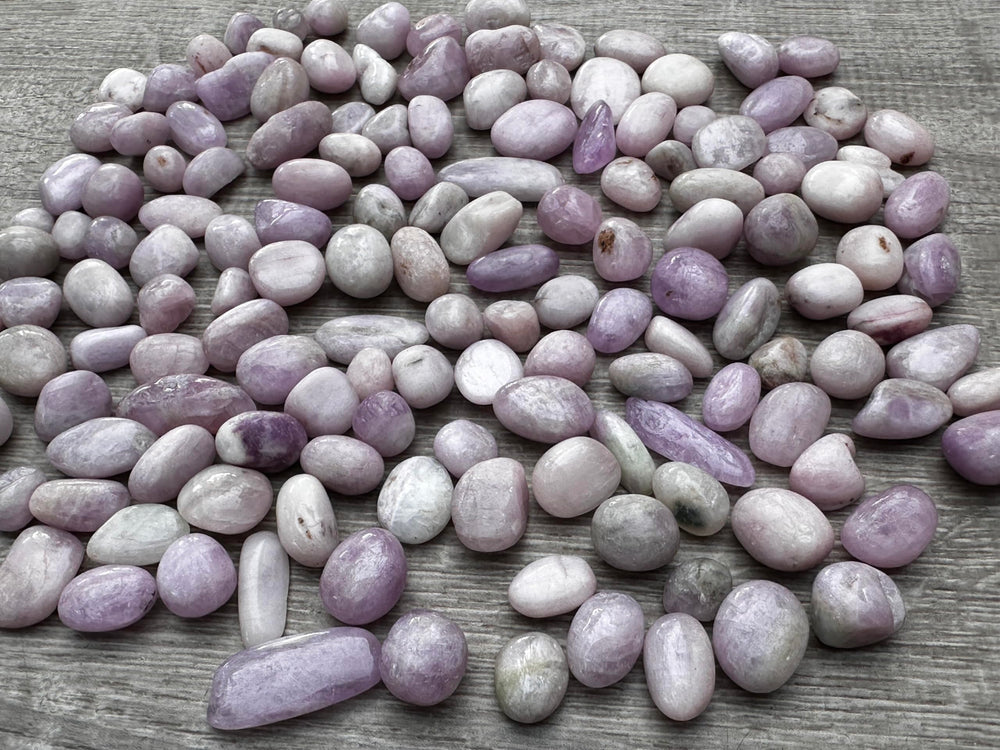 GAF TREASURES Kunzite healing crystals arranged for crystal grid and energy work.