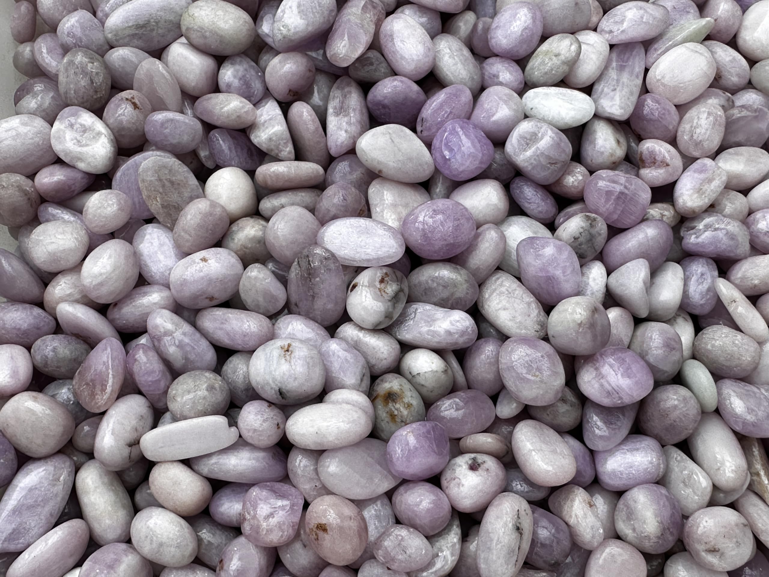 GAF TREASURES Kunzite stones travel well in pouches for on-the-go calm.