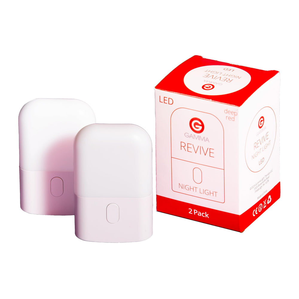 Gamma Light Therapy Revive red night light wall plug glows softly for safe nighttime navigation.