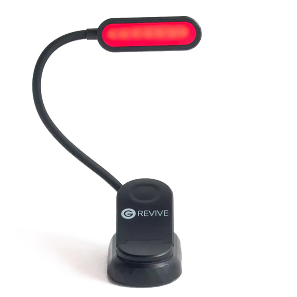 Gamma Revive red reading light closeup with warm blue-light-free glow.