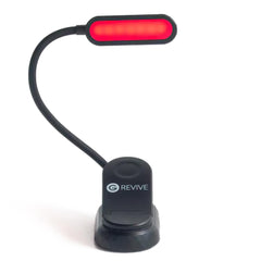 Gamma Revive red reading light closeup with warm blue-light-free glow.
