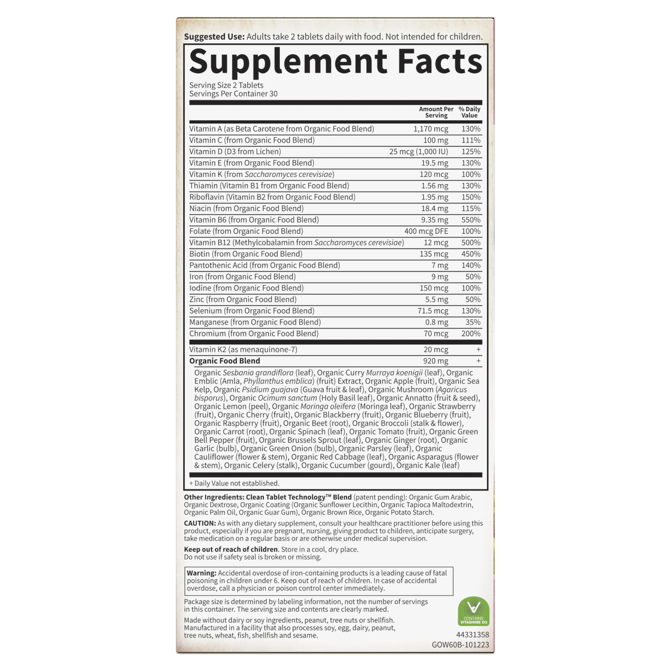 Garden of Life Organics Women's Multi bottle on clean surface for wellness routine.