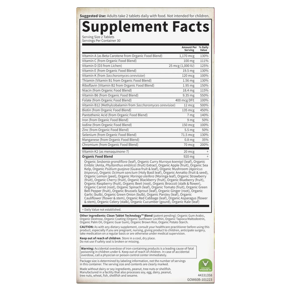 Garden of Life Organics Women's Multi bottle on clean surface for wellness routine.