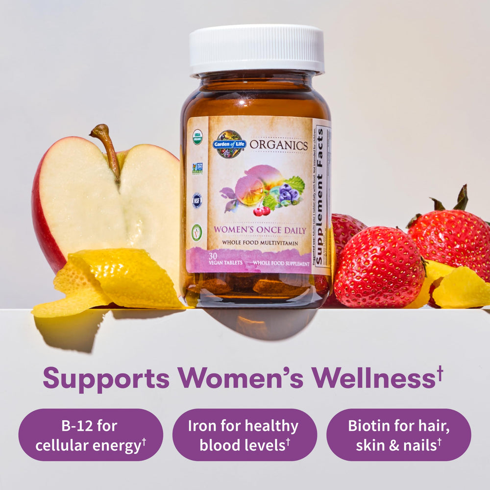 Close up of Garden of Life Organics Women Multivitamin tablet highlighting plant based nutrients.