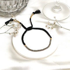 GEMPIRES boho-inspired pyrite bracelet styled in a stacked look