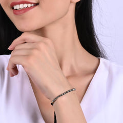 GEMPIRES pyrite bracelet with golden shimmer on wrist highlighting luxurious detail
