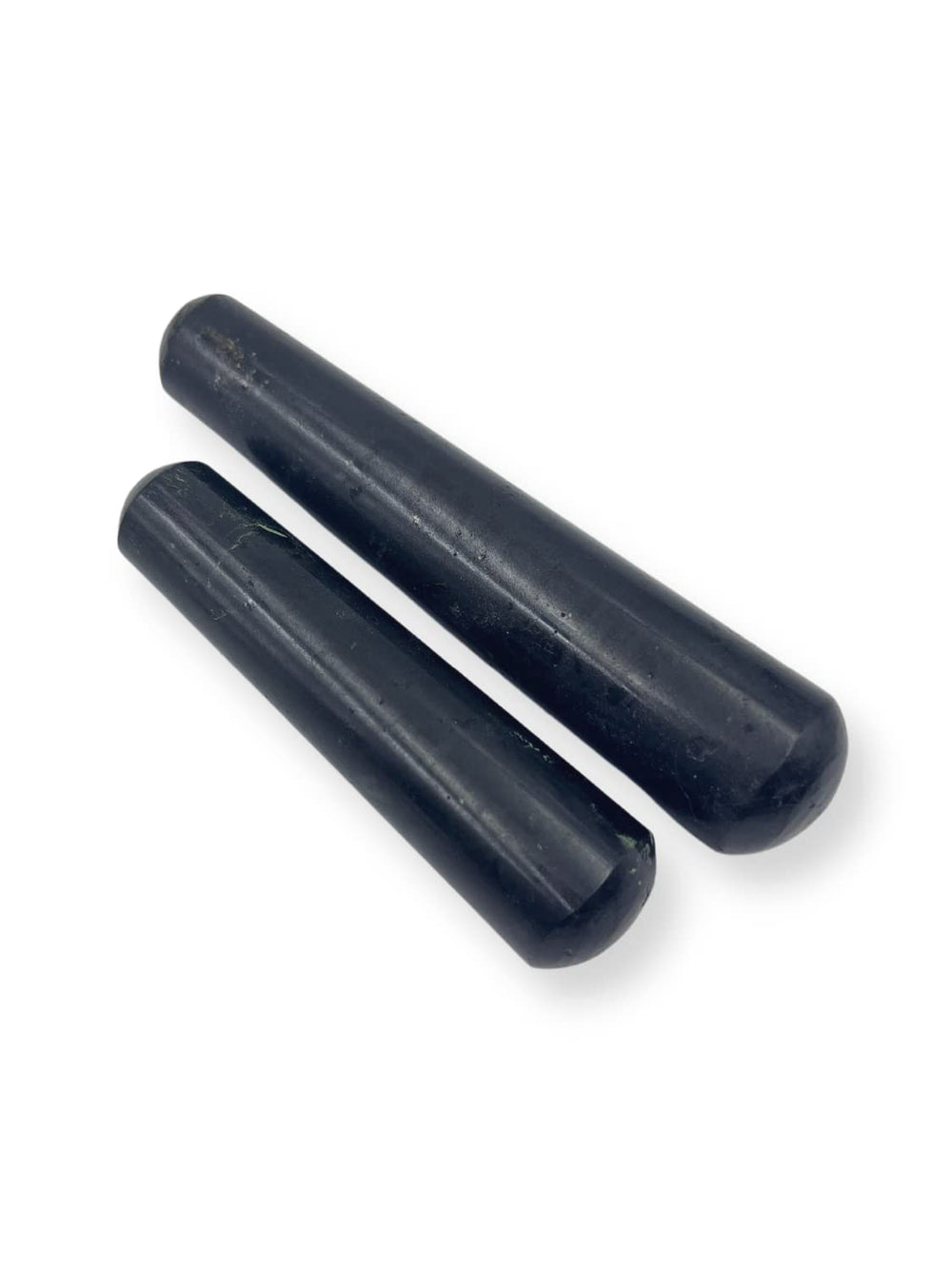 Gemscite wand held in hand during meditation for focused attention.