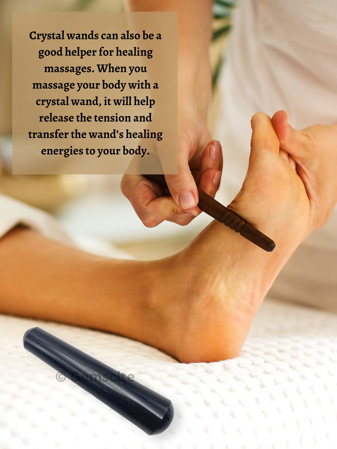 Handheld wand with smooth rounded tip for gentle massage ritual.