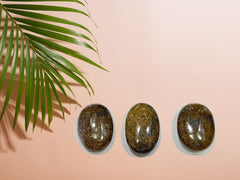 GEMSCITE Bronzite pocket stone used in energy work and chakra rituals.