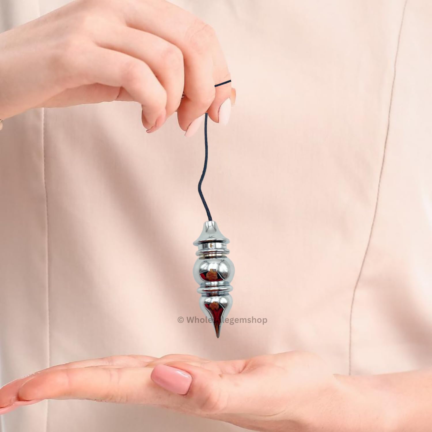 GEMSCITE brushed steel copper pendulum combines durability with striking look.