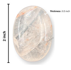 GEMSCITE clear quartz pocket palm stone closeup aiding energy work during meditation.