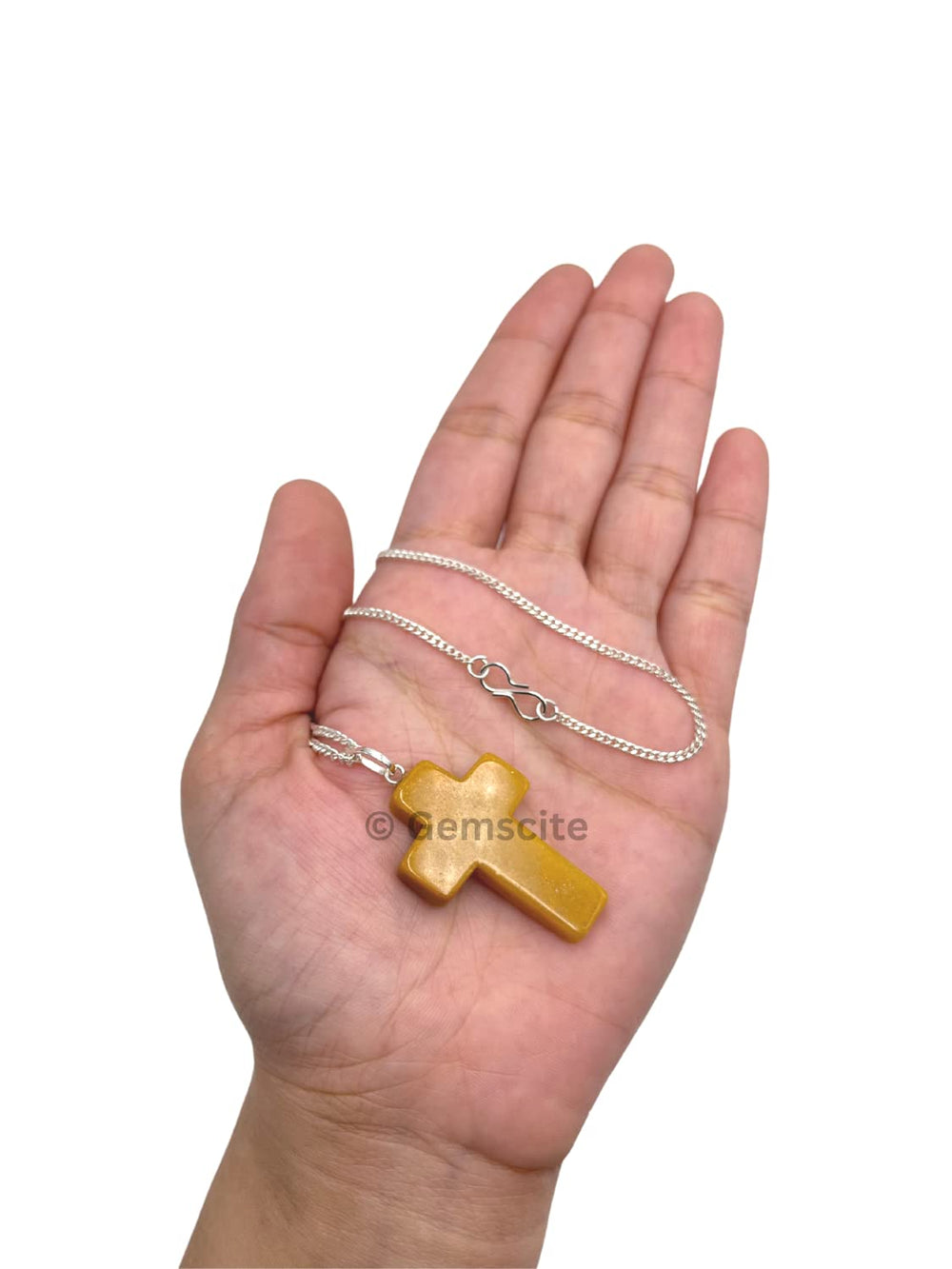 GEMSCITE Cross Pendant in velvet pouch ready for gifting.