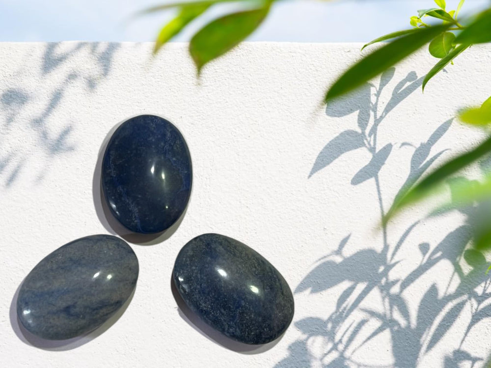 Gemscite Dumortierite palm stone carved detail showcases artisan craftsmanship