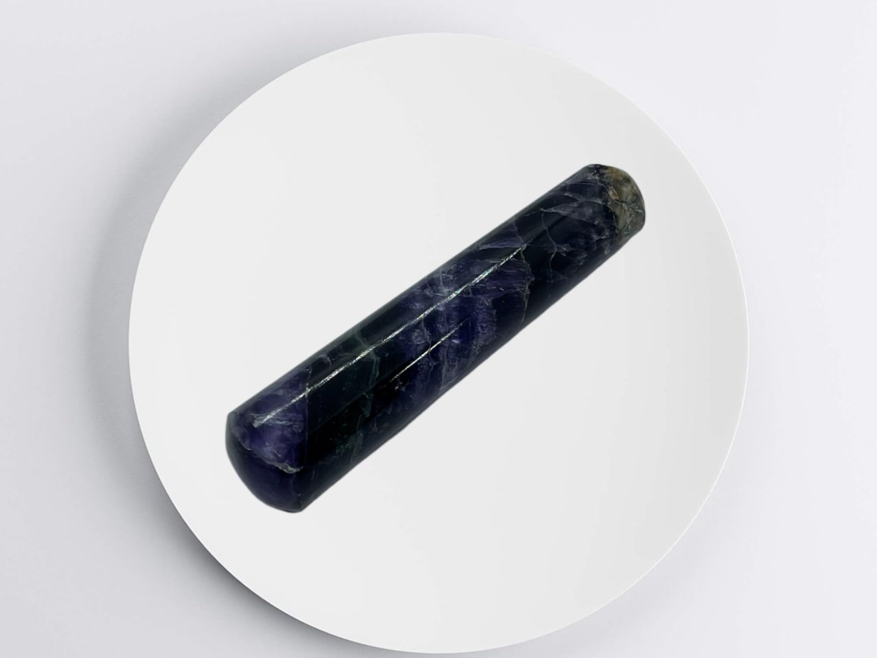 GEMSCITE Multi Flourite wand with natural variations adds unique character to rituals.