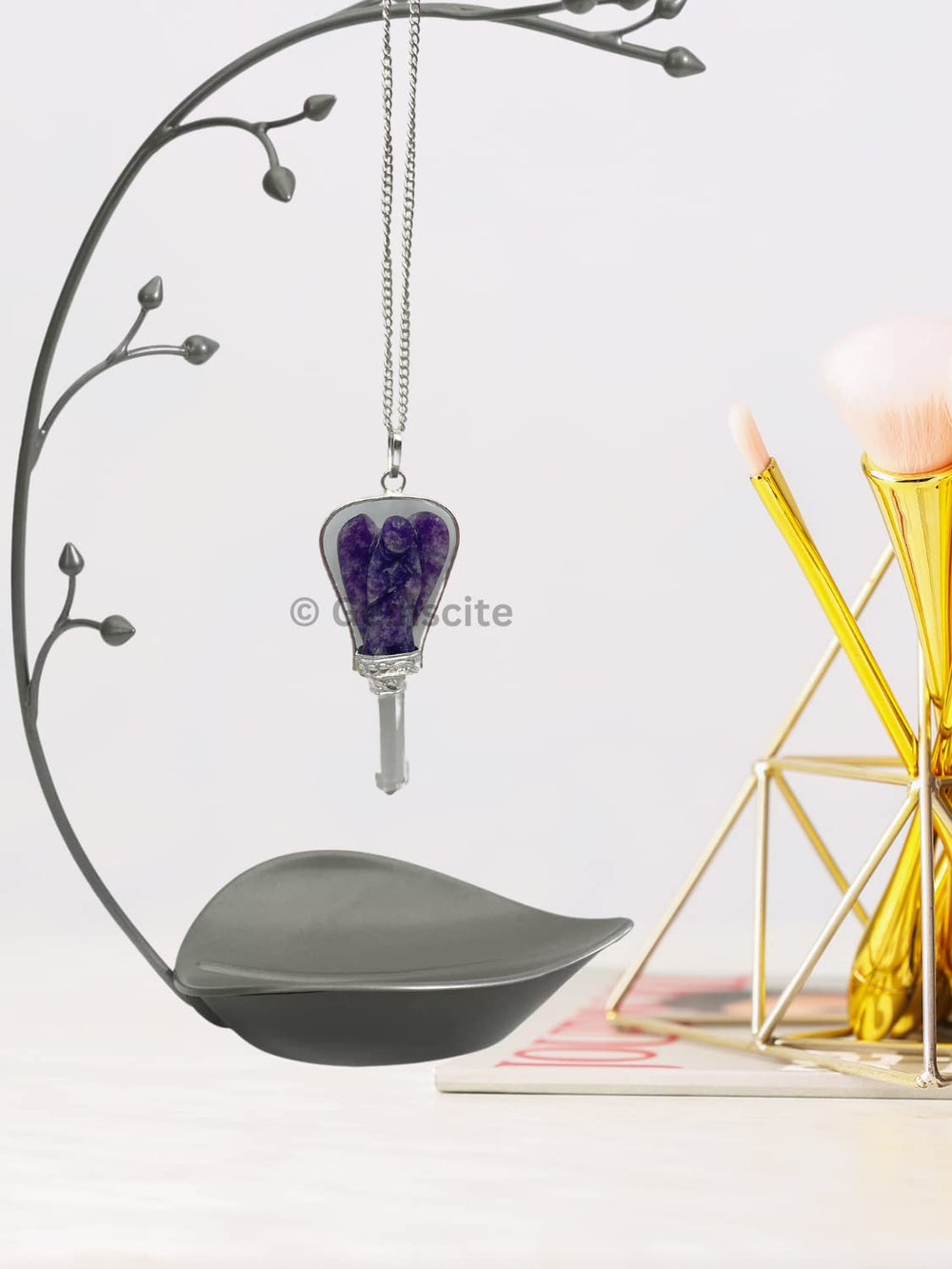 GEMSCITE lepidolite and quartz pendant showing natural variation