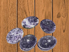 GEMSCITE Lepidolite worry stone close-up shows natural color patterns