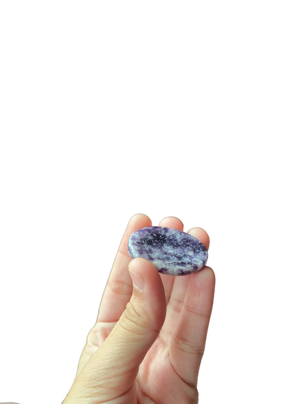 GEMSCITE Lepidolite worry stone being rubbed during quiet moments