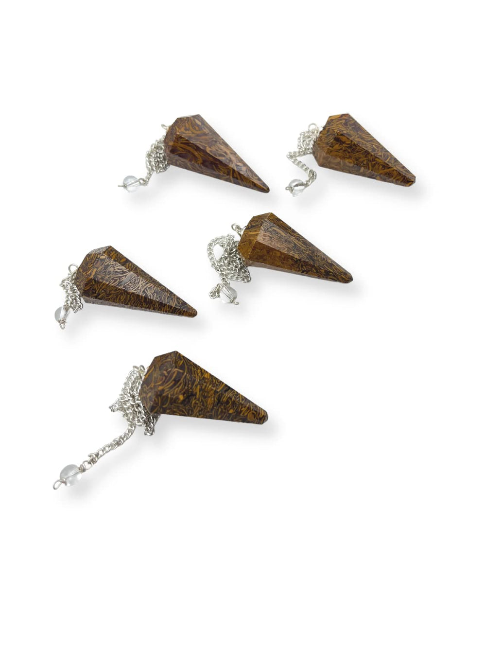 GEMSCITE Mariyam pendulum integrated in spiritual practice setup.