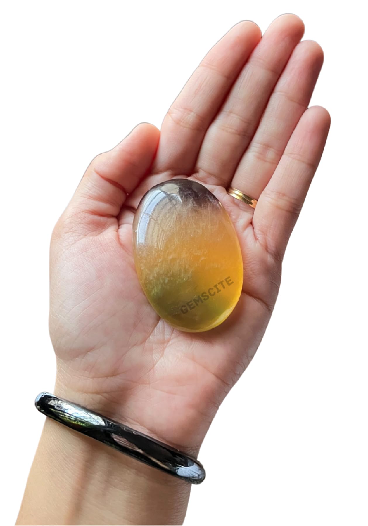 GEMSCITE Multi Fluorite pocket stone on desk inspires calm and clear intention.