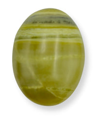 GEMSCITE serpentine palm stone, carved detail for calm focus during meditation.