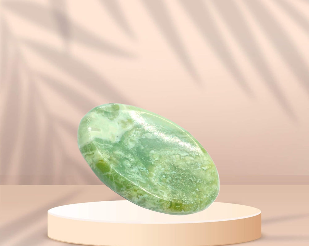 GEMSCITE Serpentine worry stone in its pouch for portable serenity.