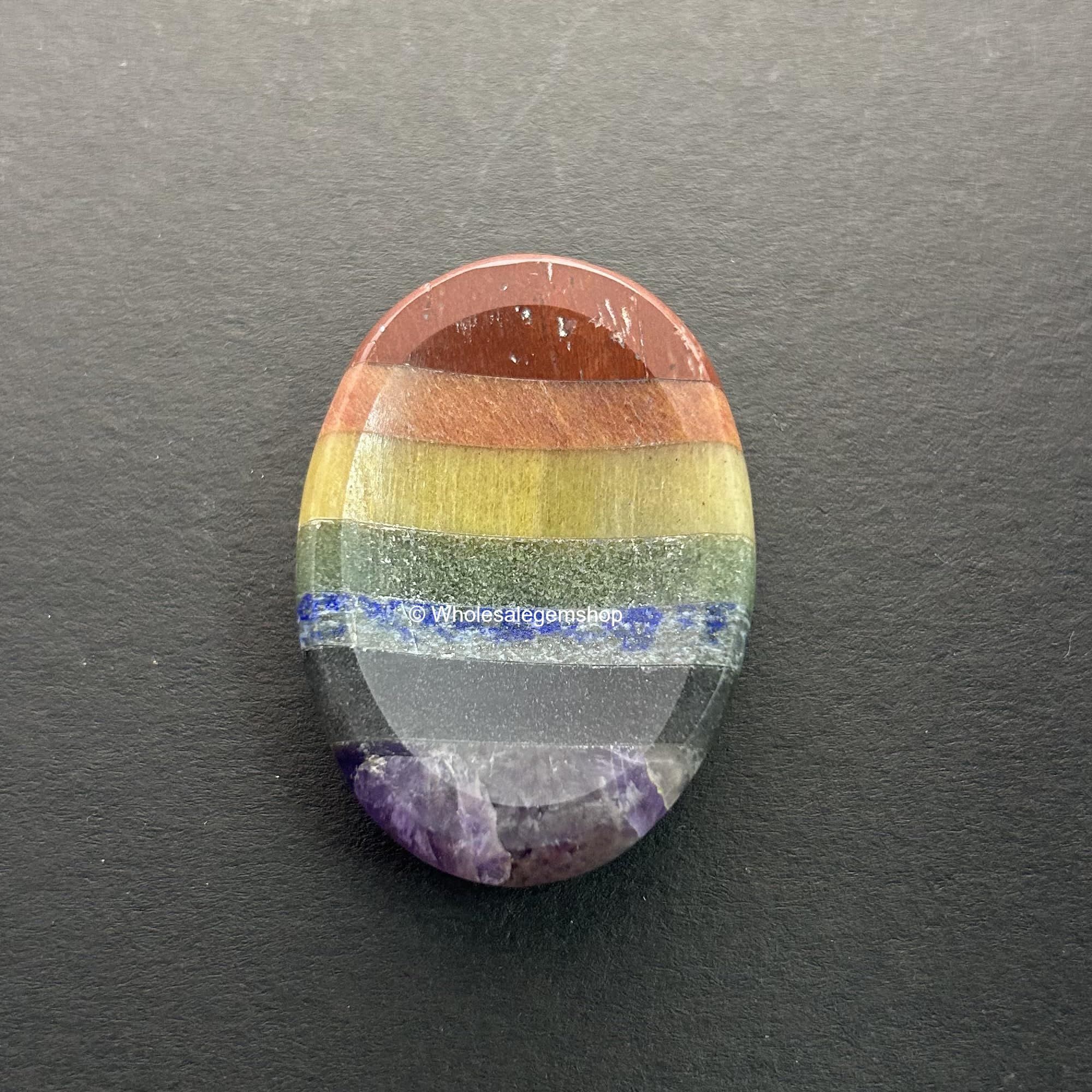 GEMSCITE thumb indentation worry stone designed for easy rubbing and relaxation.
