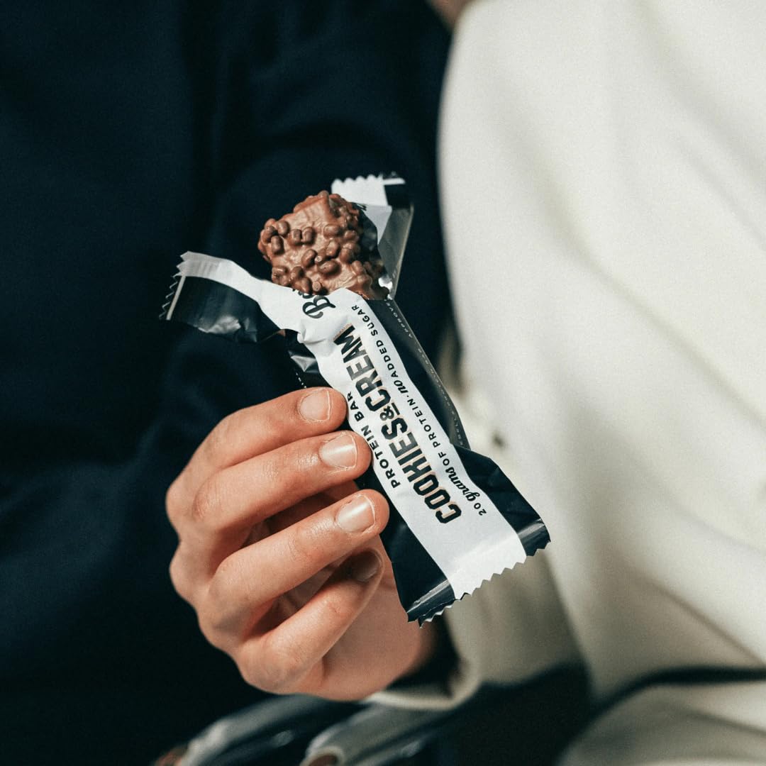 Generic BarebeIIs protein bar close-up showing 20g protein per bar.