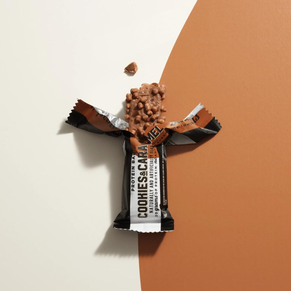 Generic BarebeIIs Cookies & Cream bar with creamy texture for indulgent snacking.