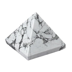 Generic Howlite crystal pyramid centerpiece for calming energy at home.