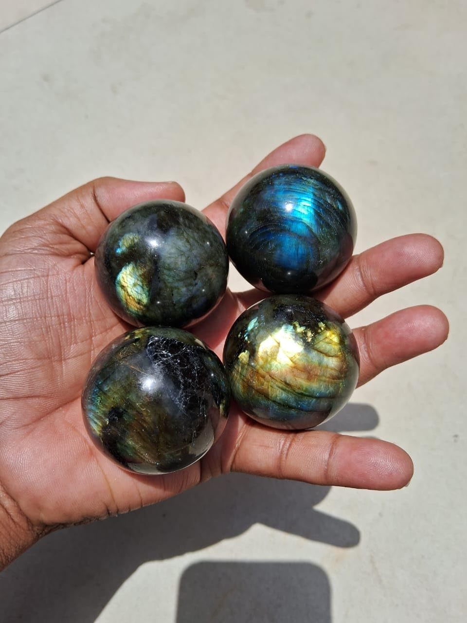 Labradorite meditation ball promotes calm during mindful practice.