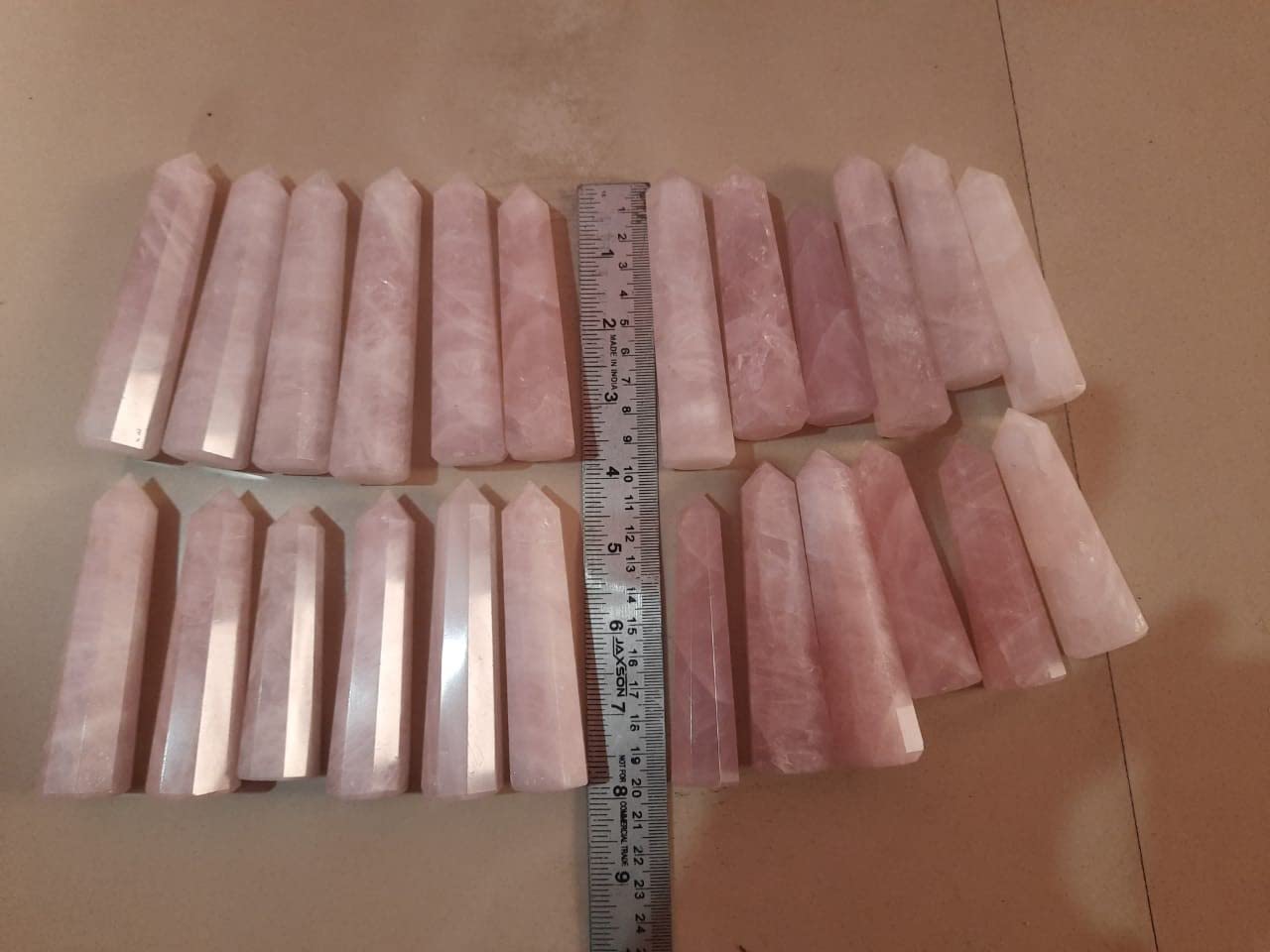 Generic Natural Rose Quartz Crystal Wand for calming rituals and balance.