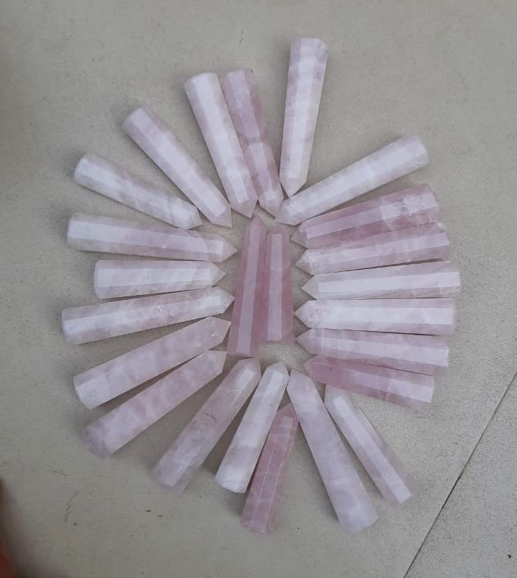 Generic Rose Quartz Crystal Point Wand with smooth polish for calming touch.