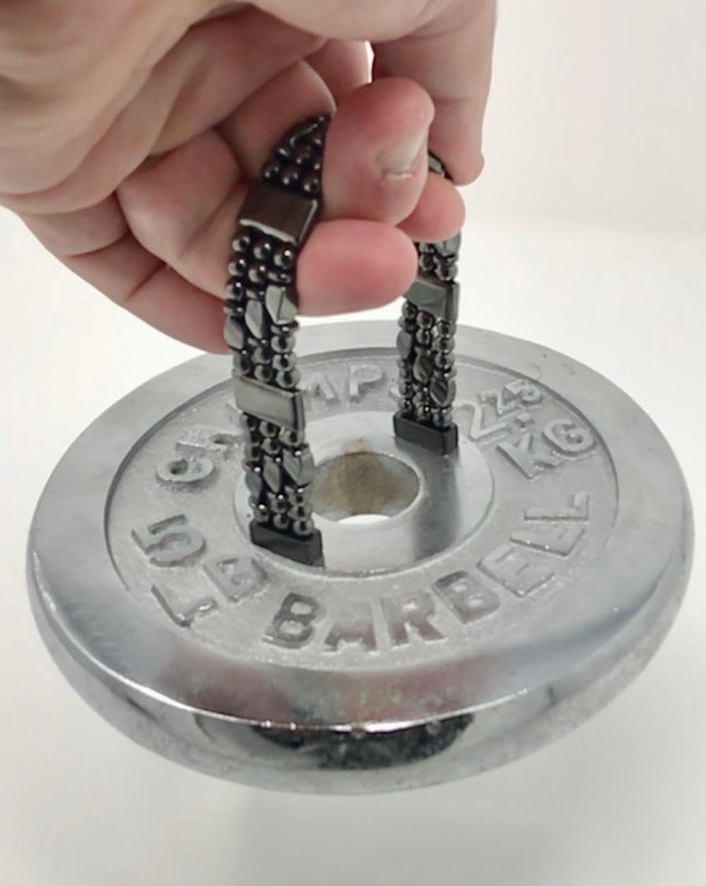 Generic Tri-Power hematite bracelet size guide close-up.