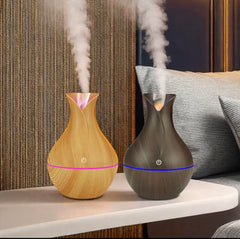 Generic USB Aroma Therapy Diffuser black in-use demonstrating ambient mist at desk