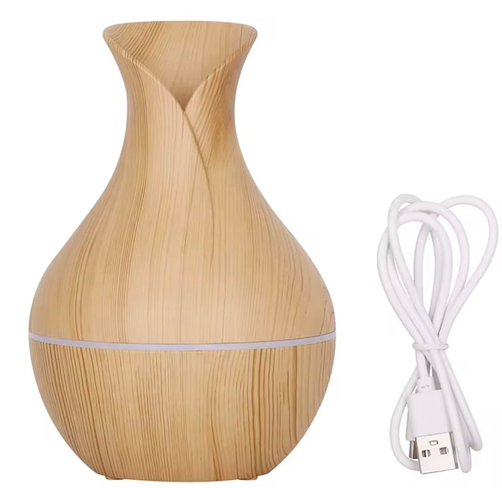Generic USB Aroma Therapy Diffuser black top view highlighting controls and finish