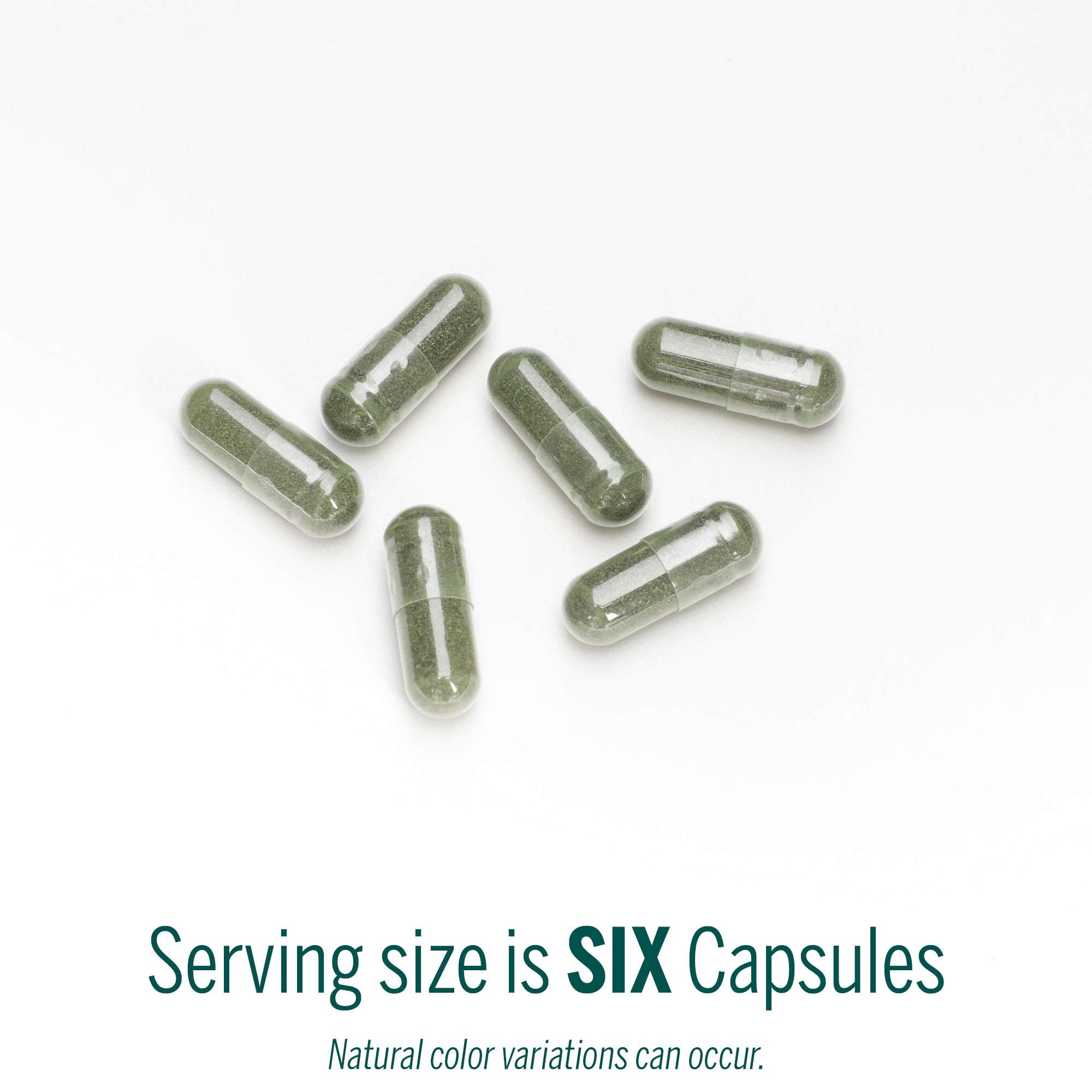 Genestra Phyto Greens Capsules pouring shot suggests easy daily use in a routine.