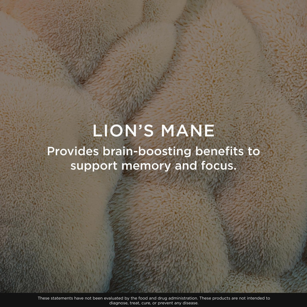 Genius Lion's Mane capsules beside mug and notebook illustrating daily cognitive routine