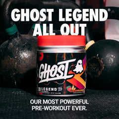 GHOST Legend All Out Strawbango powder poured into a glass for focused energy.