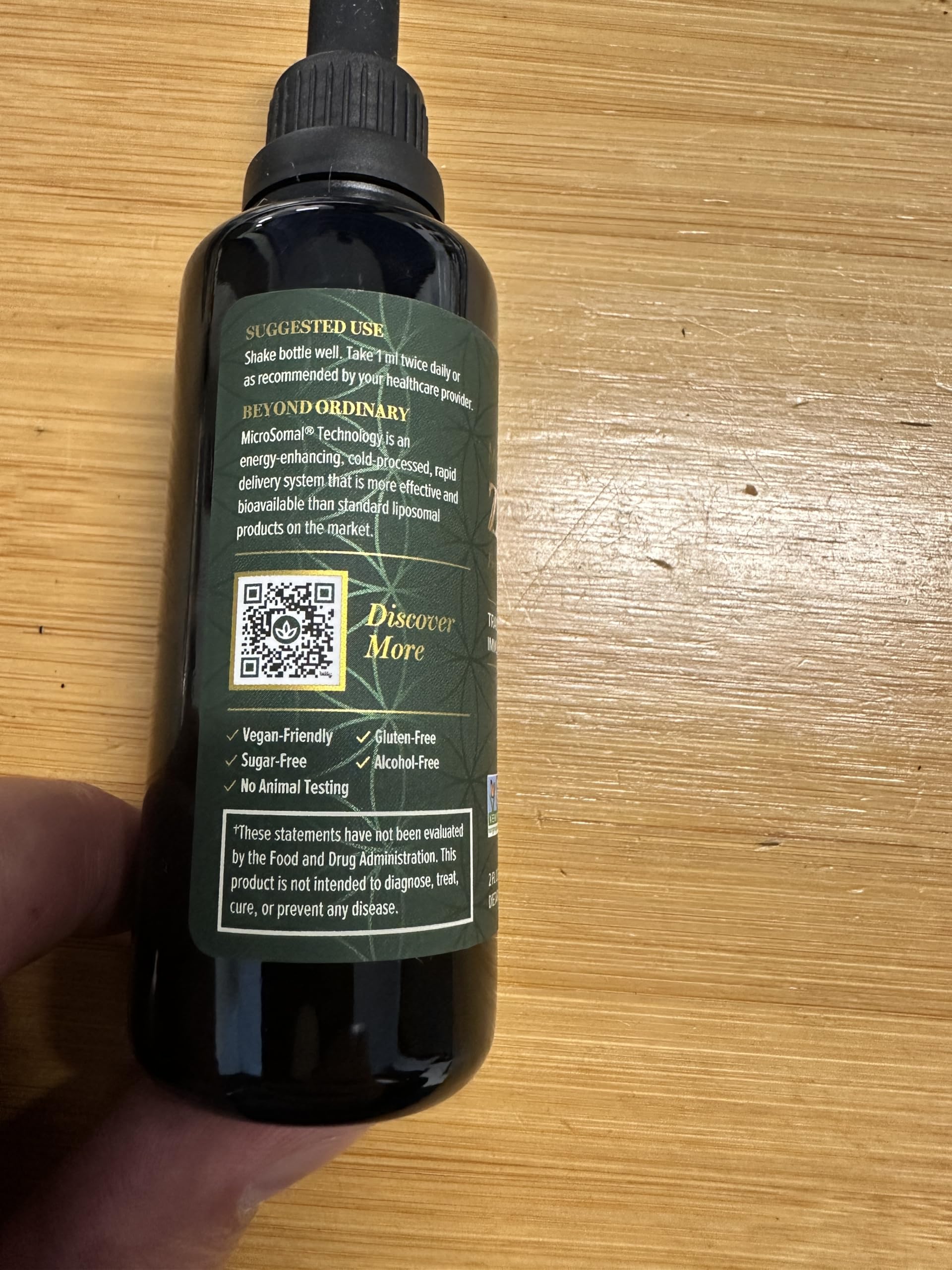 Global Healing Center zinc liquid at facility image suggesting cGMP quality.