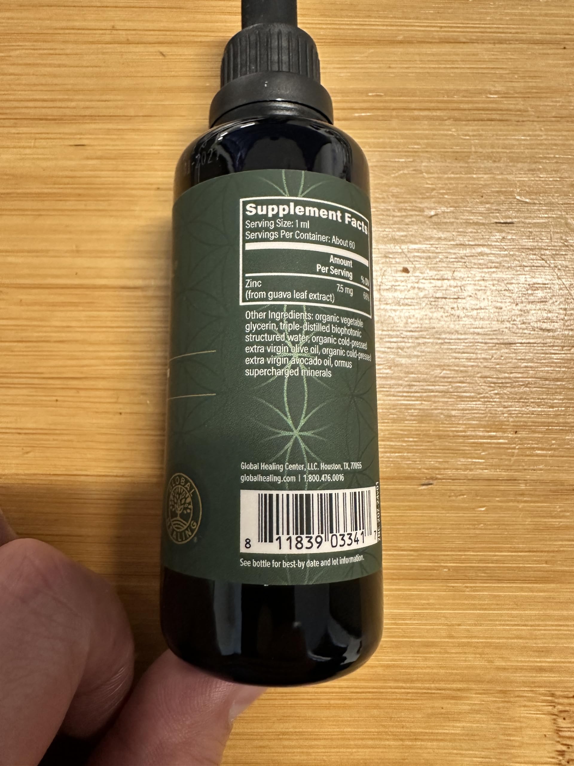Global Healing Center zinc liquid vegan badge indicating plant-based formula.